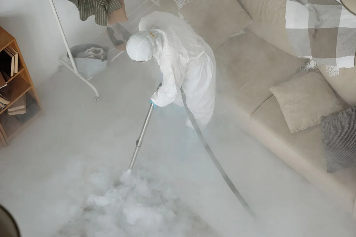 Biohazard cleanup technician in protective equipment, Vernon Center, NJ